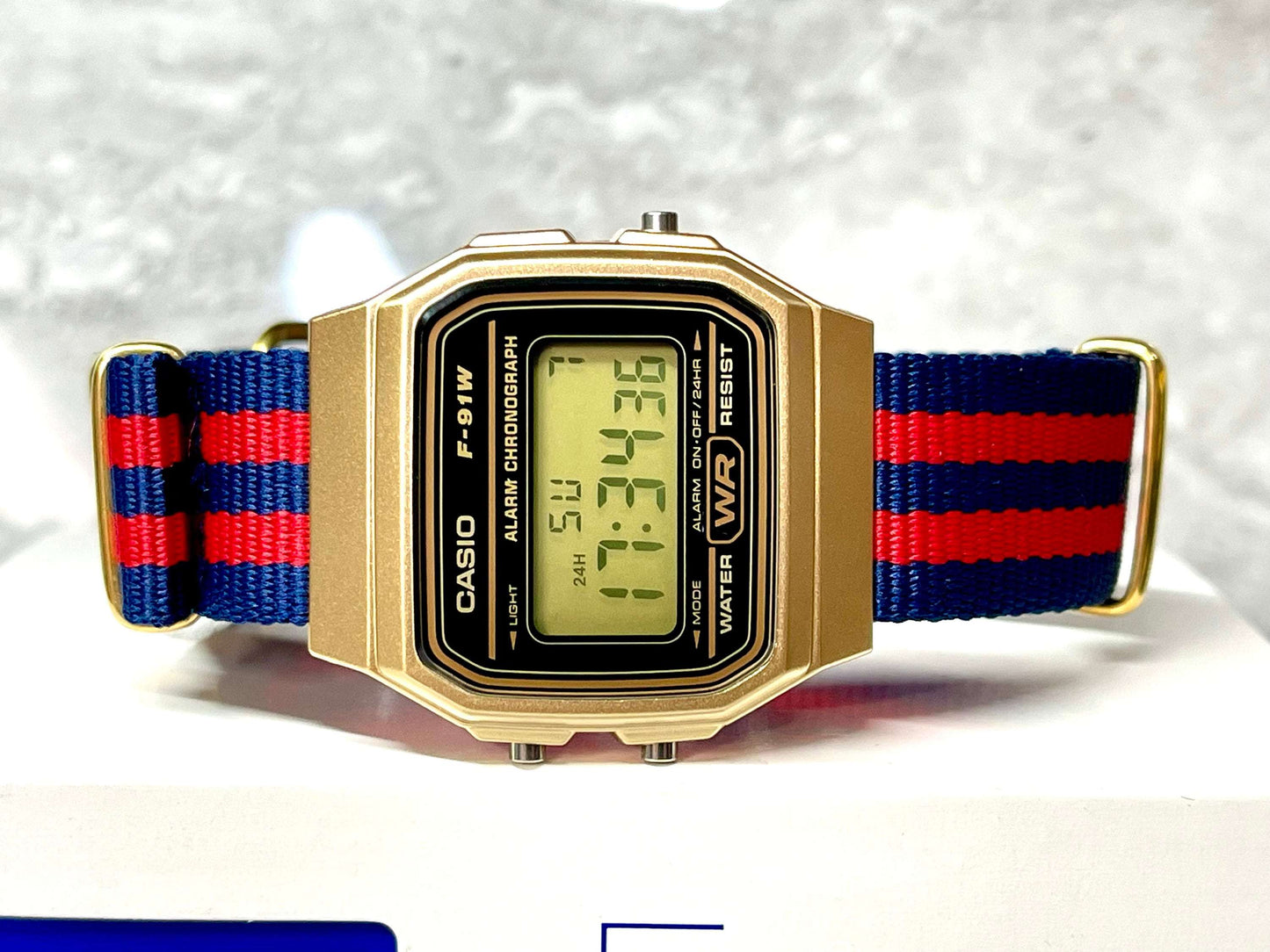 Custom Gold Casio Watch on Blue/Red Strap
