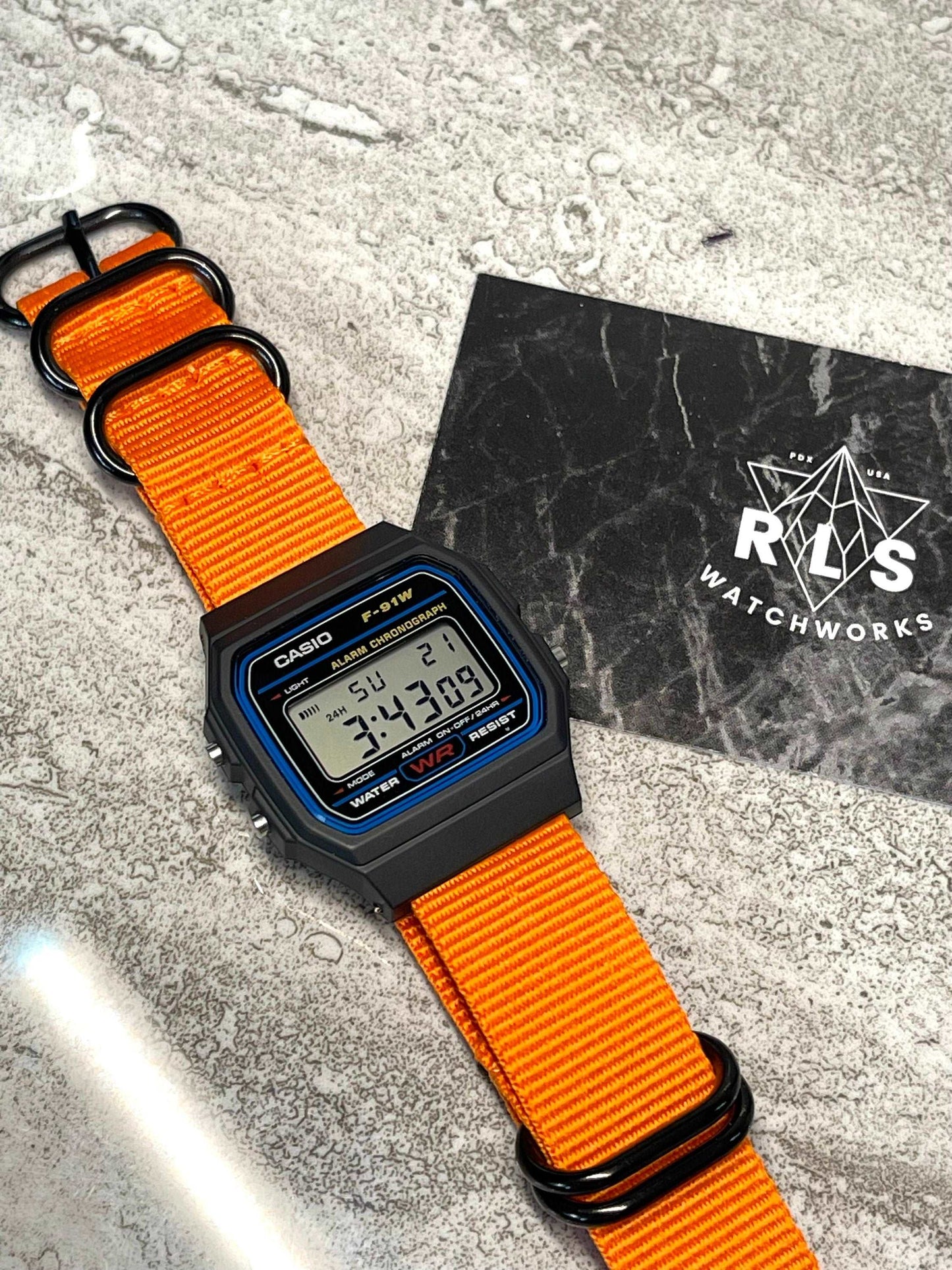 Custom Black Casio Watch on Orange Strap w/ black hardware