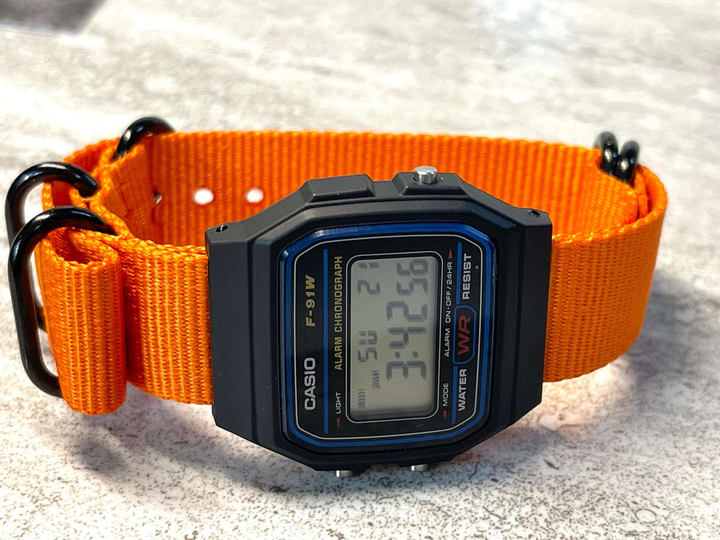Custom Black Casio Watch on Orange Strap w/ black hardware