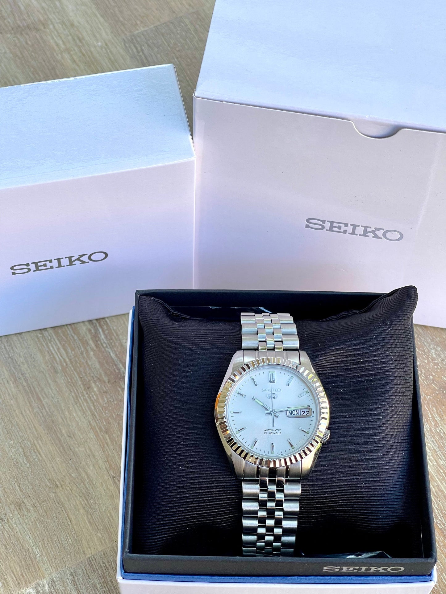The "SEIKJUST" Genuine Seiko SNK w/ Silver dial Modified - Datejust style with Sapphire crystal, Fluted Bezel, and Jubilee Style Bracelet