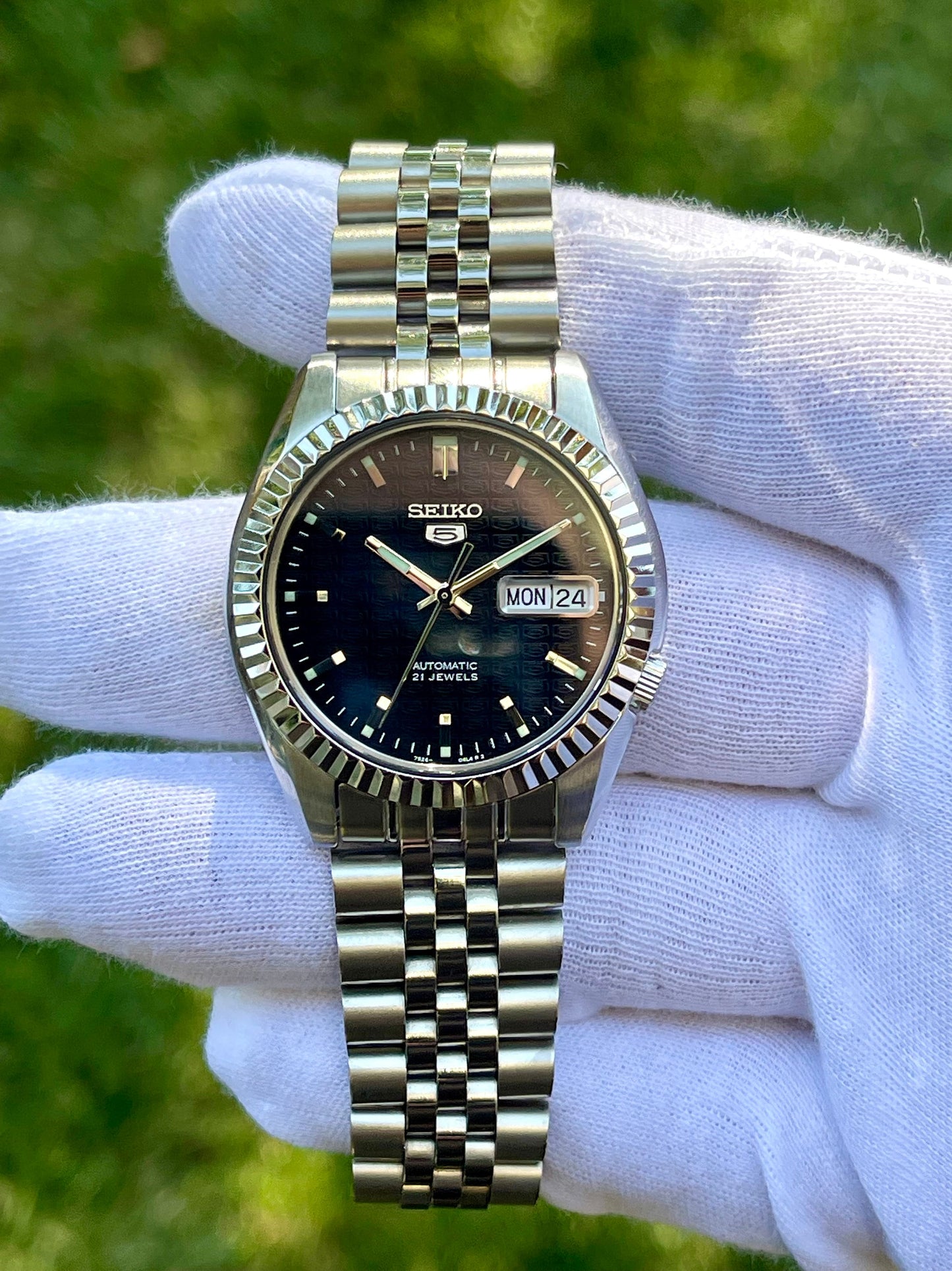 The "SEIKJUST" Genuine Seiko SNK w/ Dark Blue dial Modified - Datejust style with Sapphire crystal, Fluted Bezel, and Jubilee Style Bracelet
