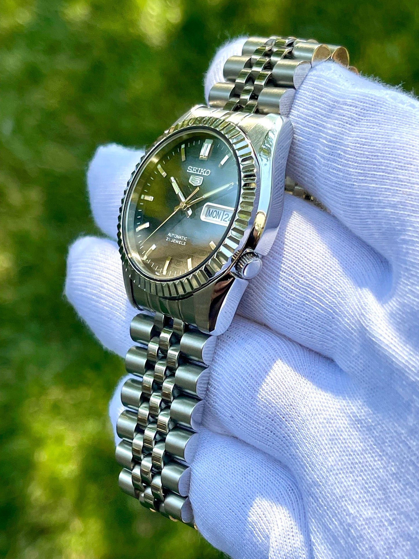 The "SEIKJUST" Genuine Seiko SNK w/ Dark Blue dial Modified - Datejust style with Sapphire crystal, Fluted Bezel, and Jubilee Style Bracelet