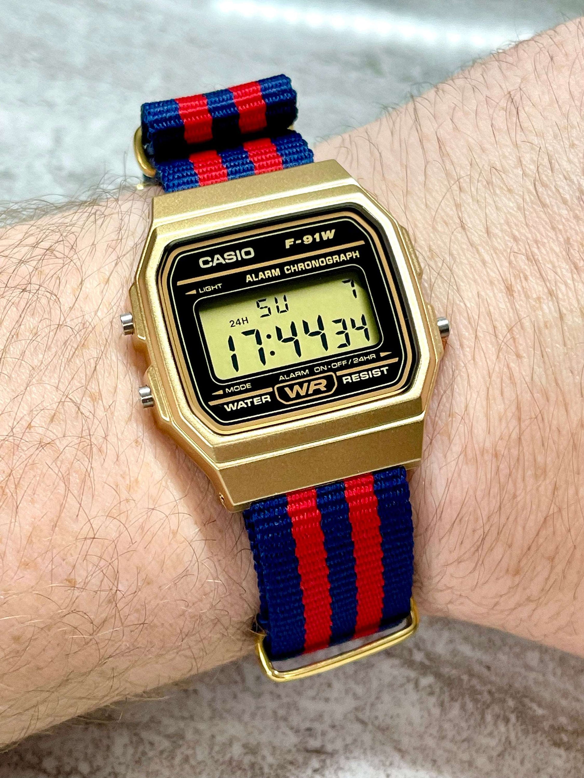 Custom Gold Casio Watch on Blue/Red Strap 