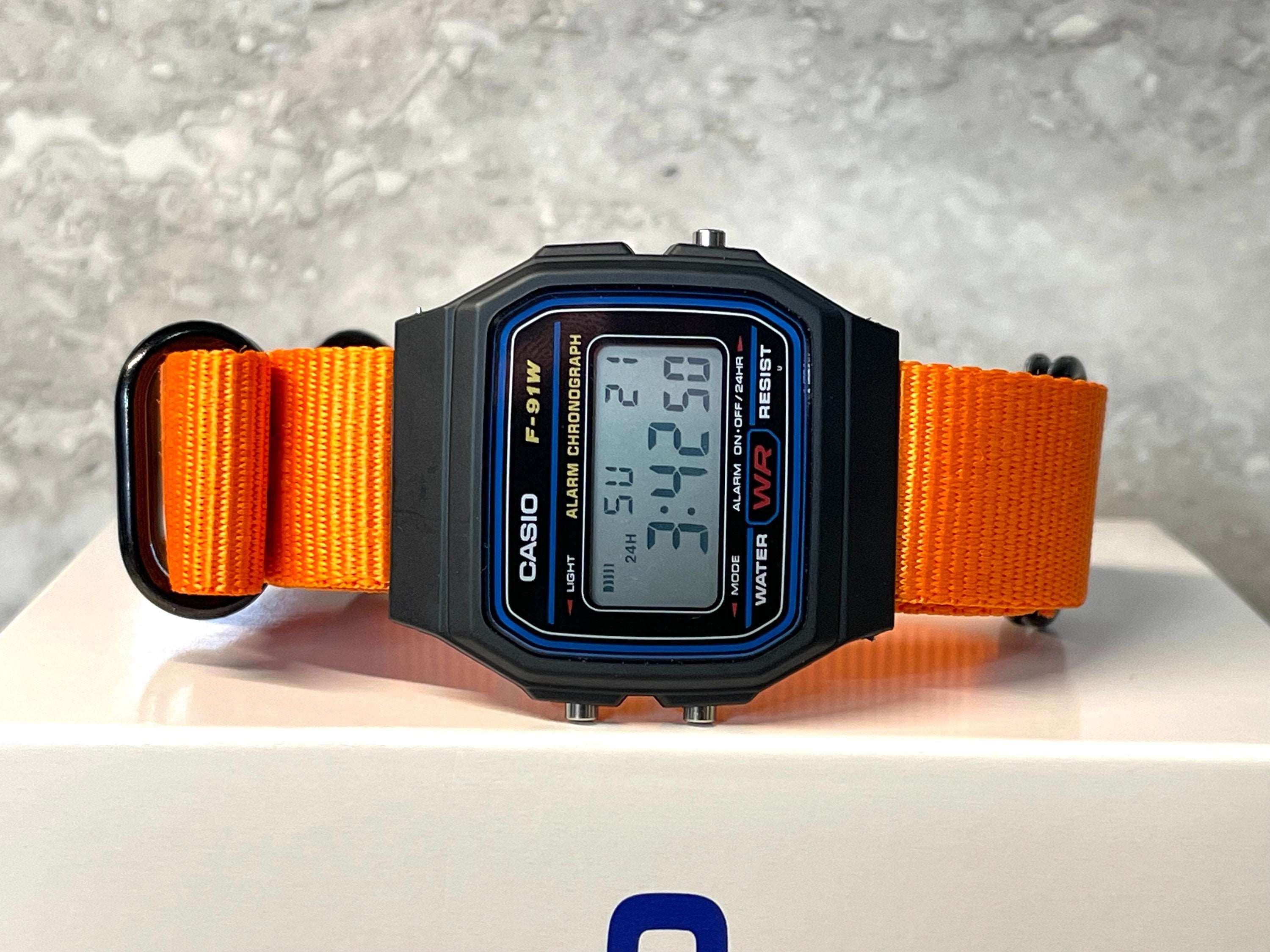 Black Casio Watch on Orange Strap w black hardware rswatchworks