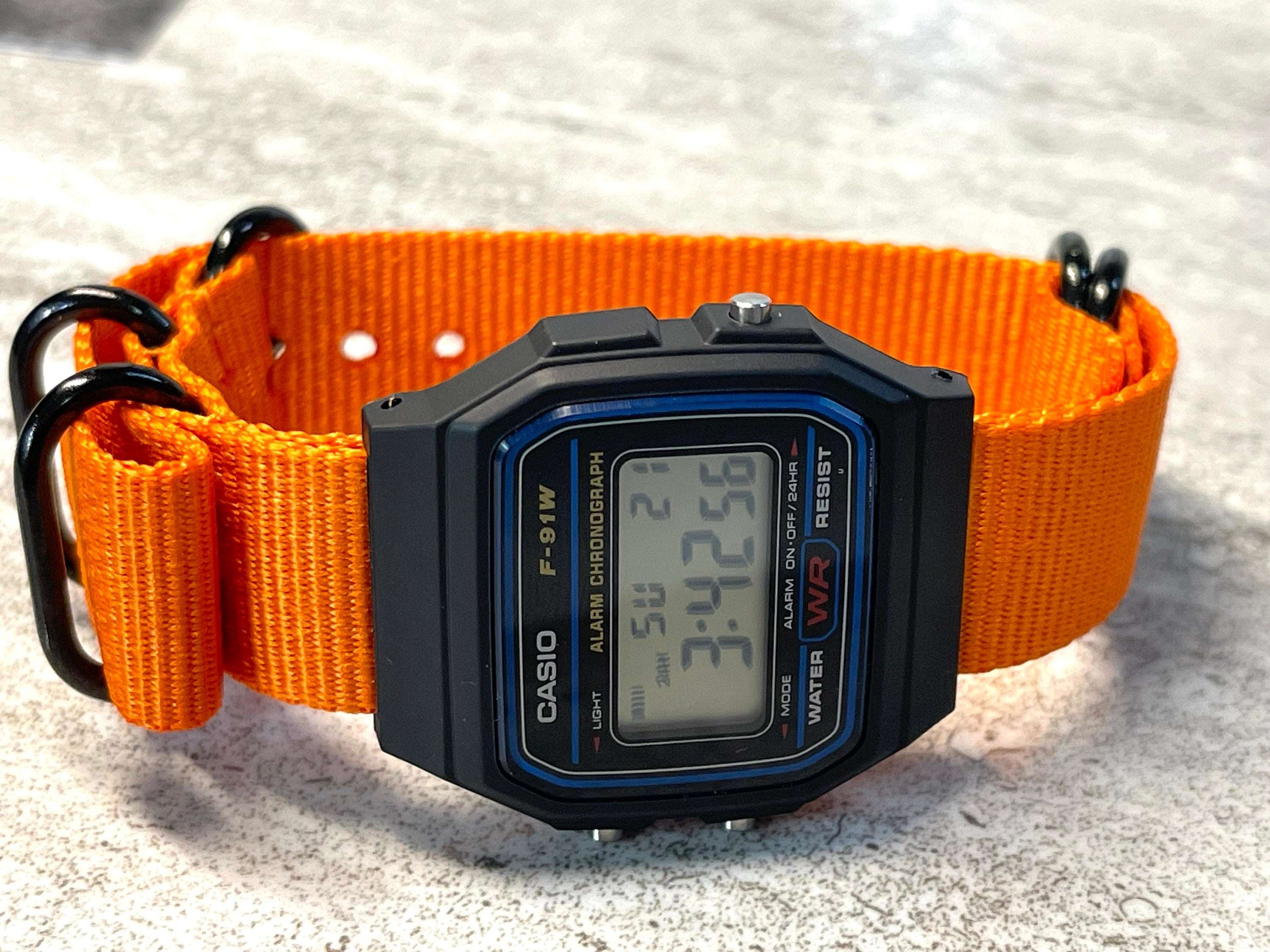 Black Casio Watch on Orange Strap w black hardware rswatchworks