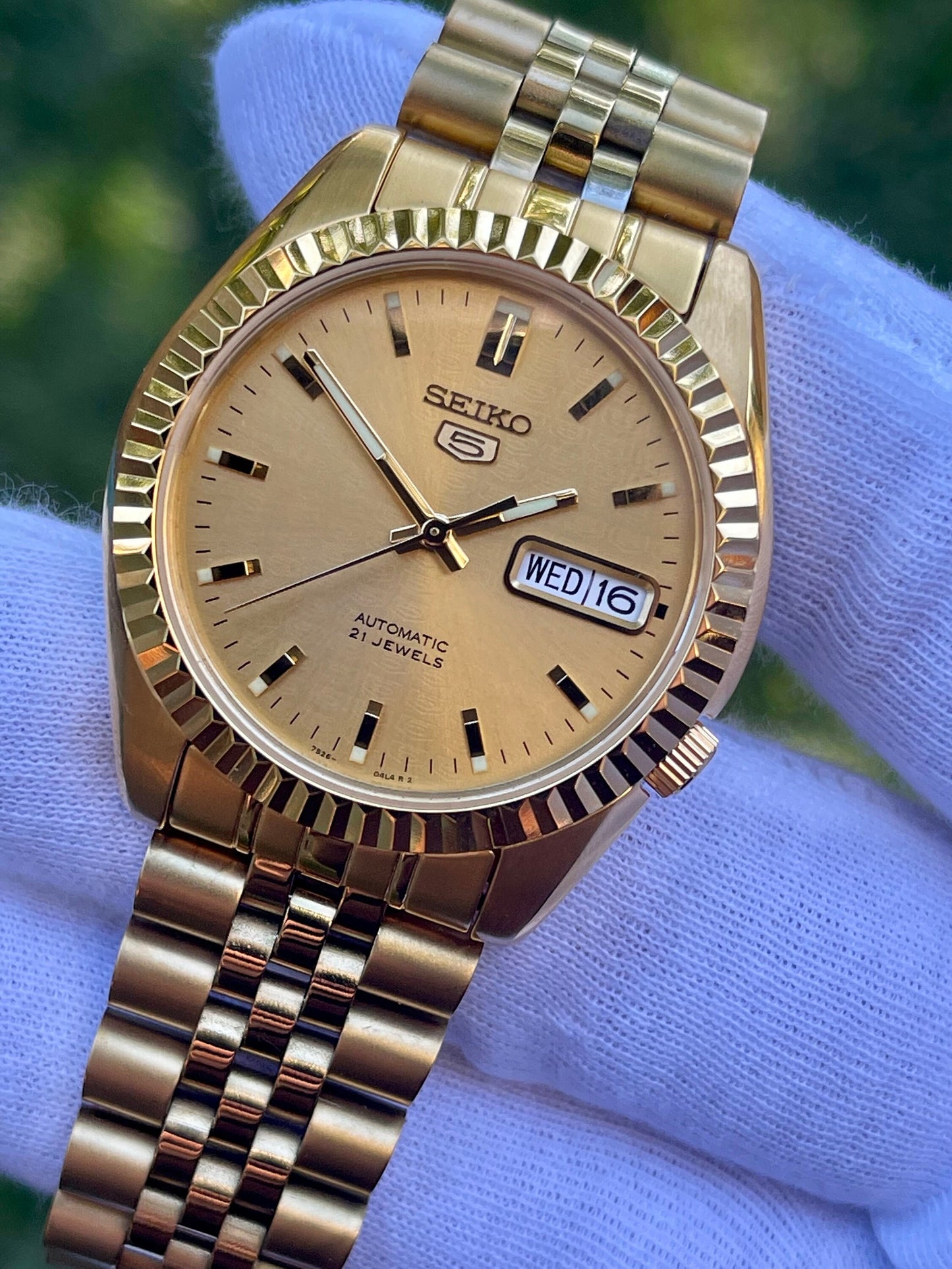 The "GOLD SEIKJUST" Genuine Seiko SNK w/ Gold dial Modified - Datejust style with Sapphire crystal, Fluted Bezel, and Jubilee Bracelet
