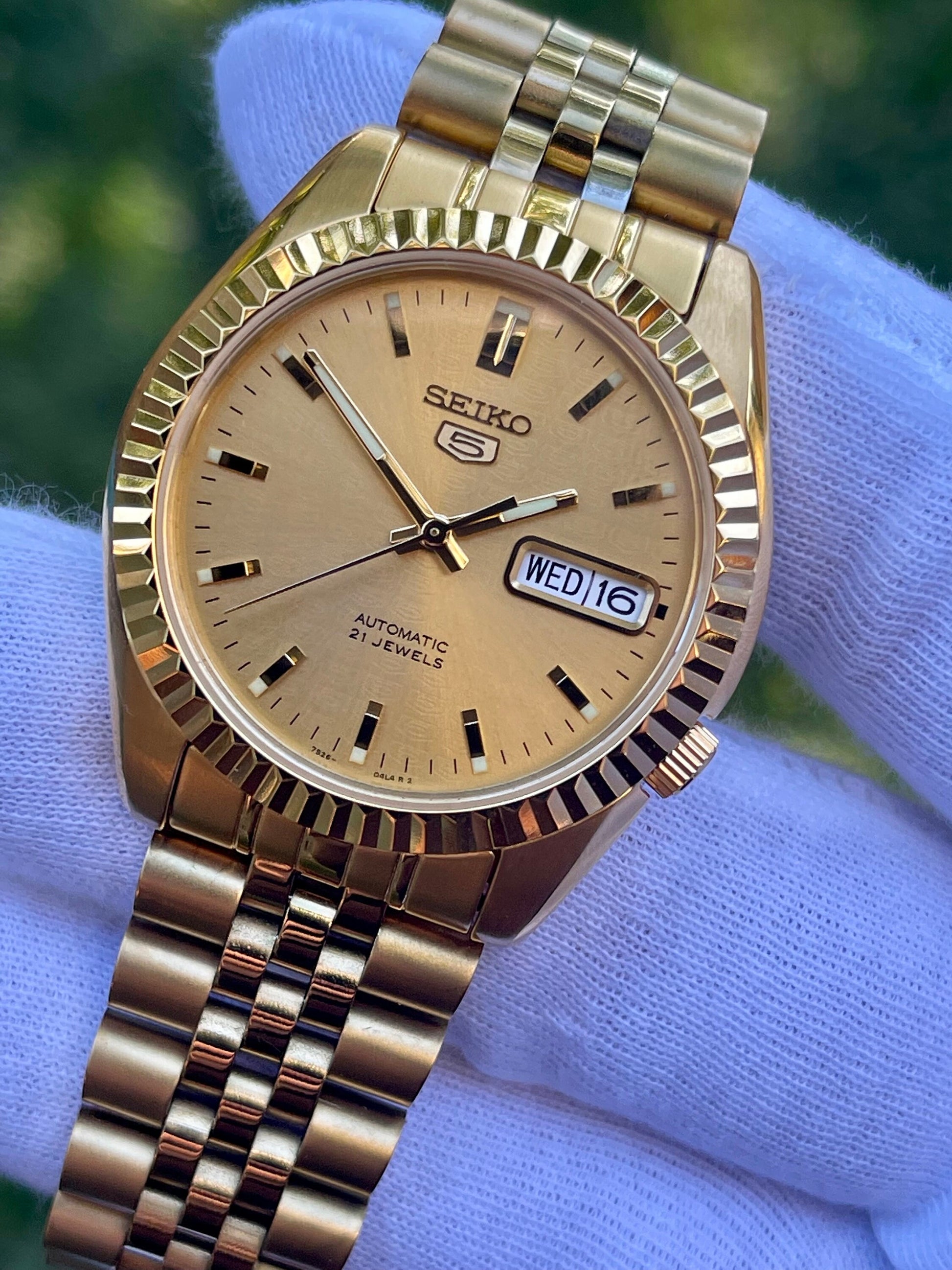 The "GOLD SEIKJUST" Genuine Seiko SNK w/ Gold dial Modified - Datejust style with Sapphire crystal, Fluted Bezel, and Jubilee Bracelet