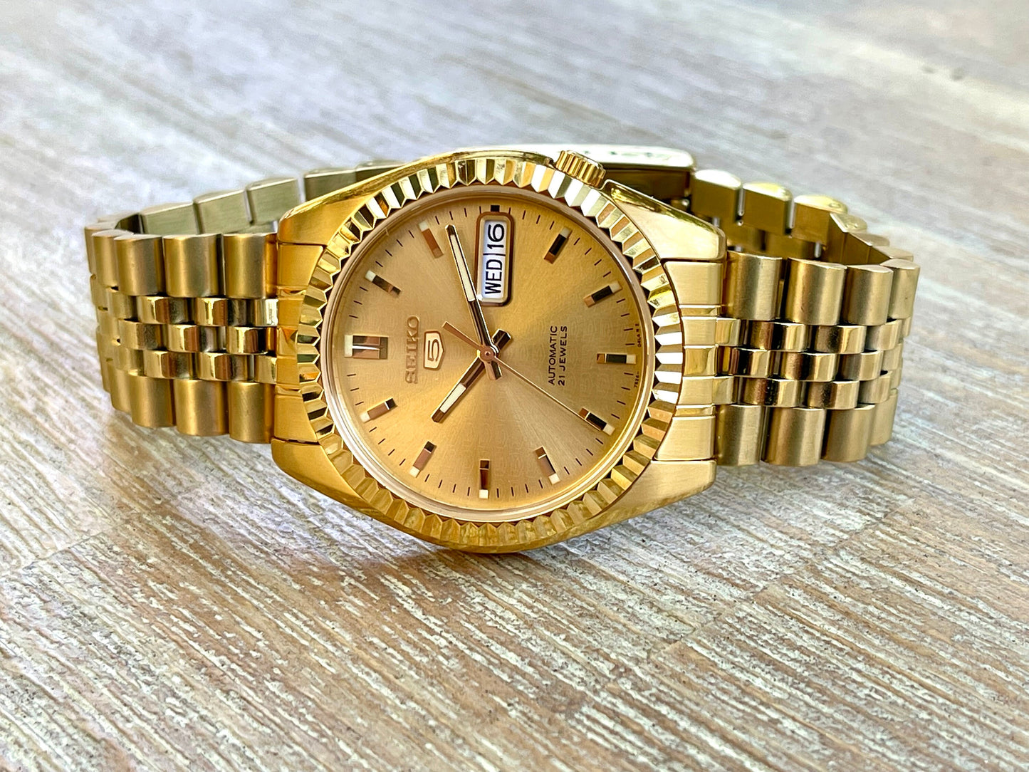The "GOLD SEIKJUST" Genuine Seiko SNK w/ Gold dial Modified - Datejust style with Sapphire crystal, Fluted Bezel, and Jubilee Bracelet