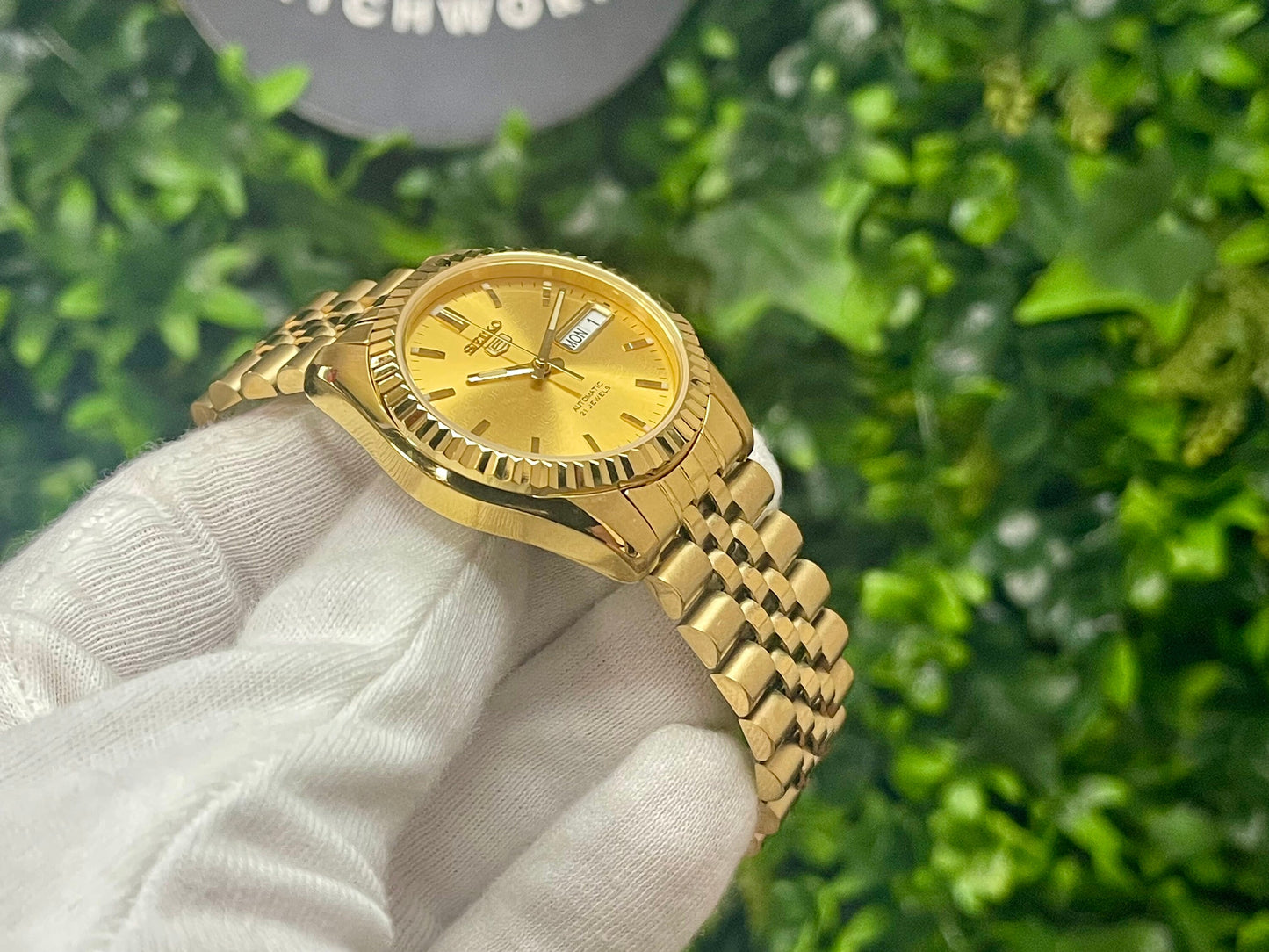 The "GOLD SEIKJUST" Genuine Seiko SNK w/ Gold dial Modified - Datejust style with Sapphire crystal, Fluted Bezel, and Jubilee Bracelet